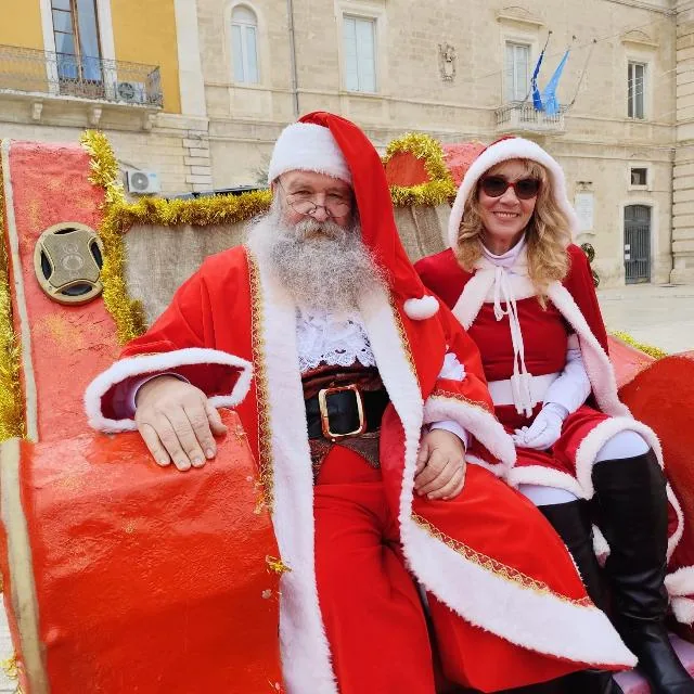 Babbo e Mamma Natale sulla slitta